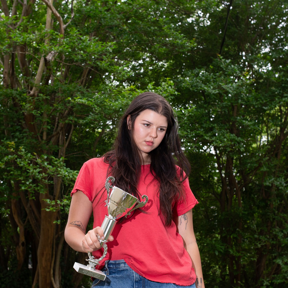 the album cover for Eliza Mclamb - Good Story [Bone/Black LP]