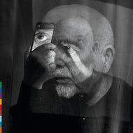 the album cover for Peter Gabriel - o\i [Indie Exclusive Dark-Side Mix Neon Purple]