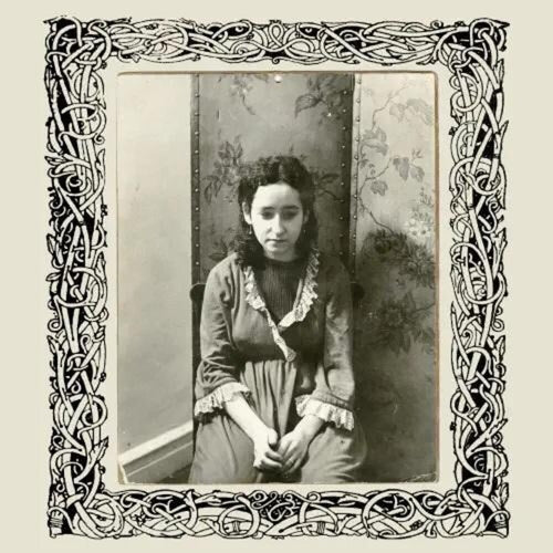 the album cover for Nora Guthrie - Emily's Ilness / Home Before Dark